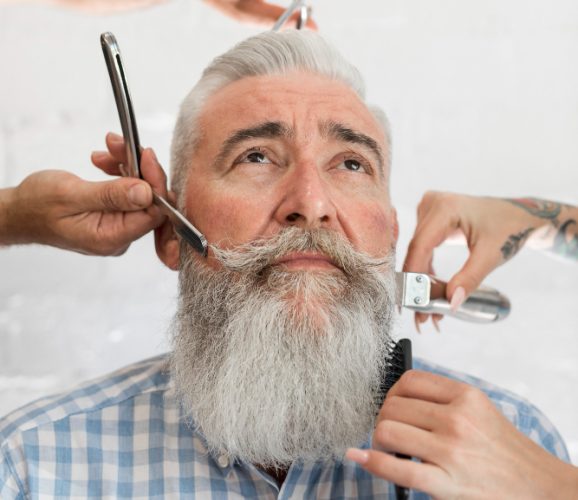 bearded-aged-man-visiting-barber-shop